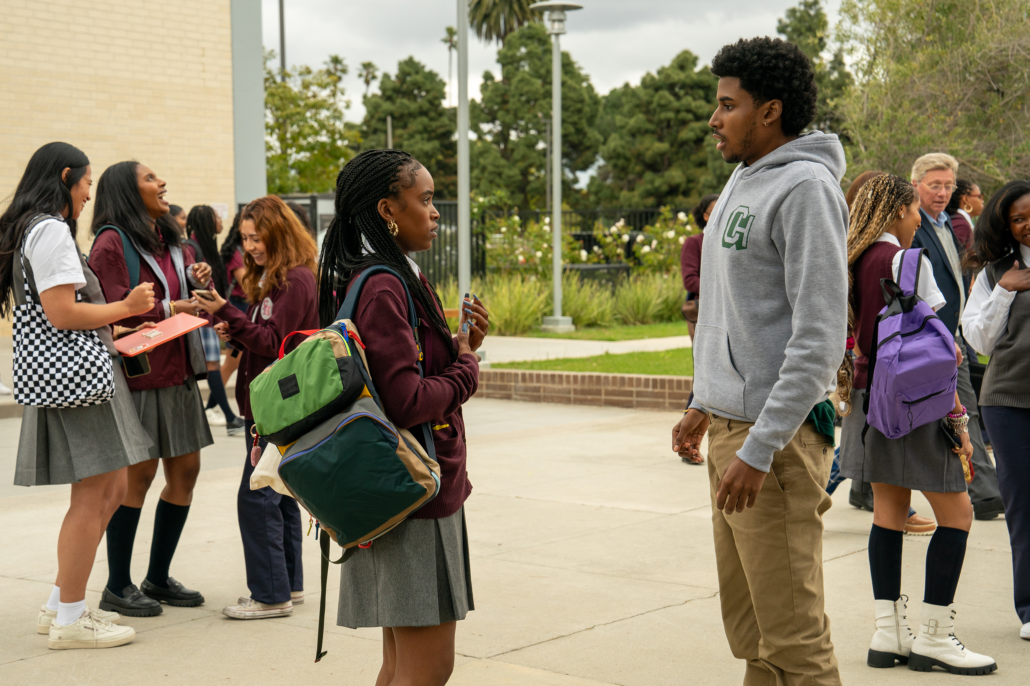 lovie simone as keisha and michael cooper jr as justin as they encounter each other outside of school in forever