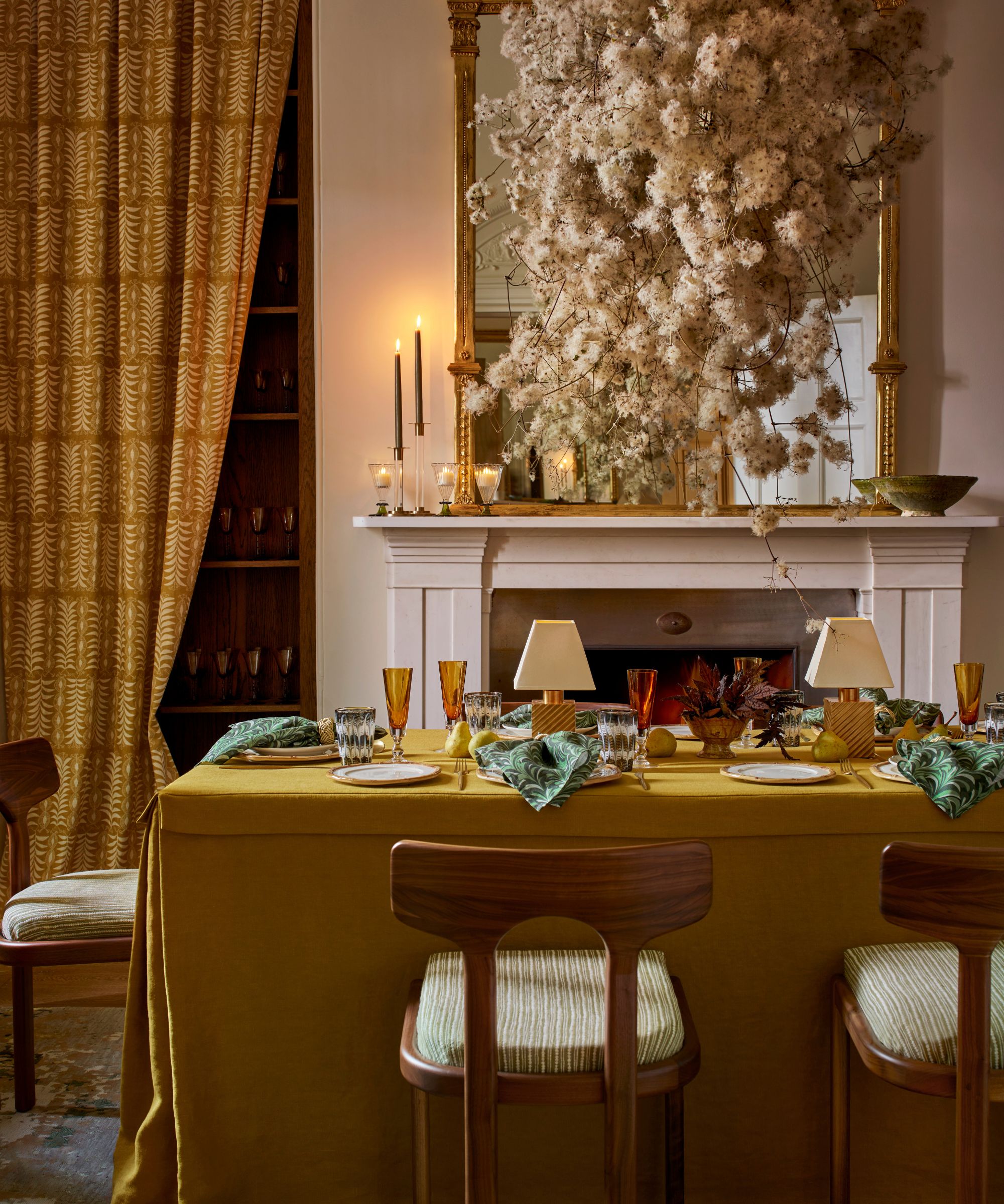 neutral and ochre yellow dining room laid for a new years dinner