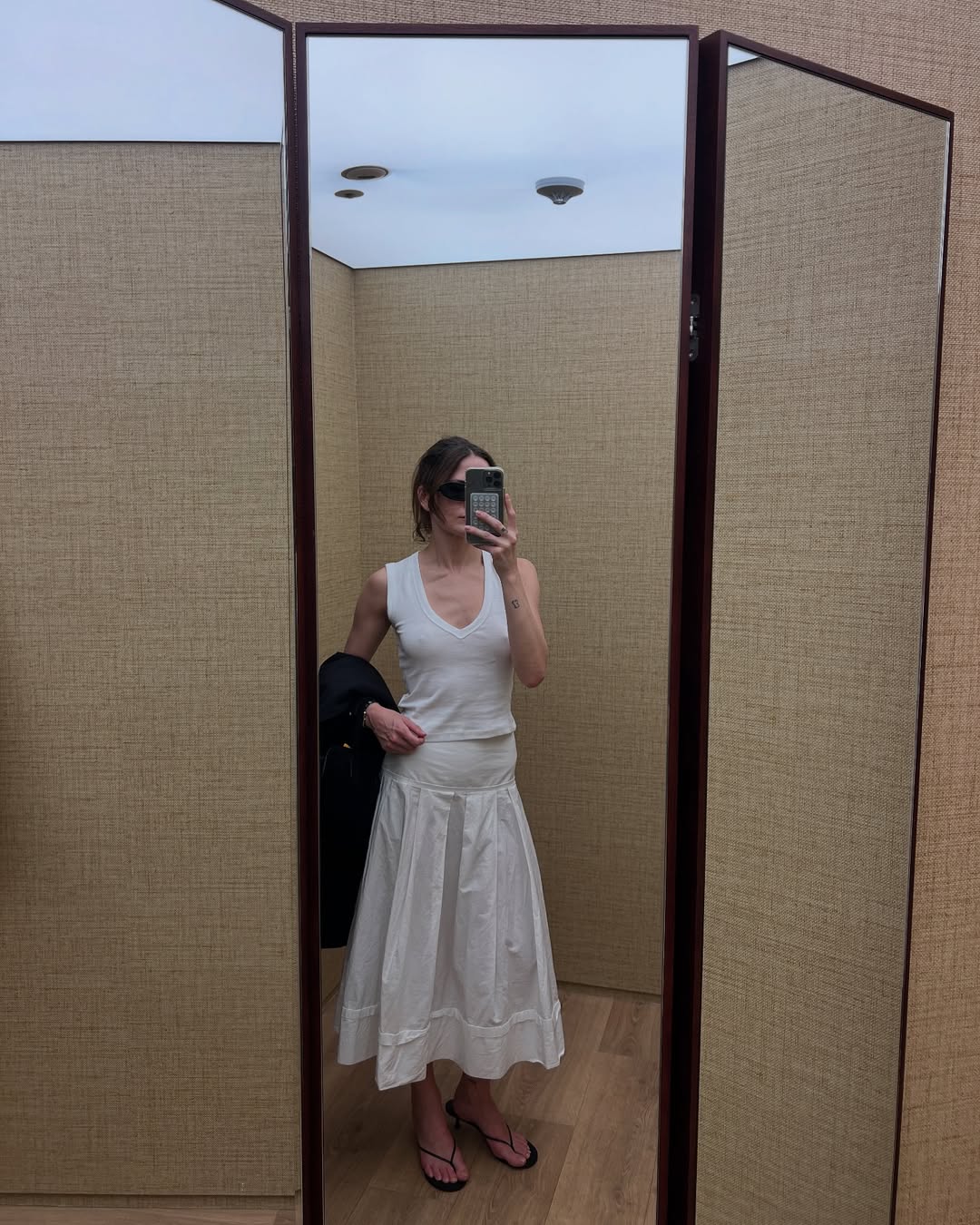 Eliza Huber wearing a V-neck tank