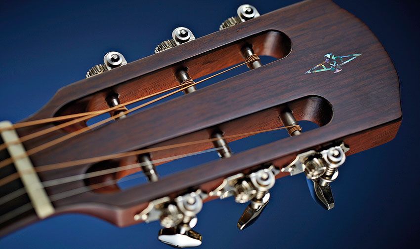 The slot headstock will make restringing a little trickier but also increases the behind the nut string angle