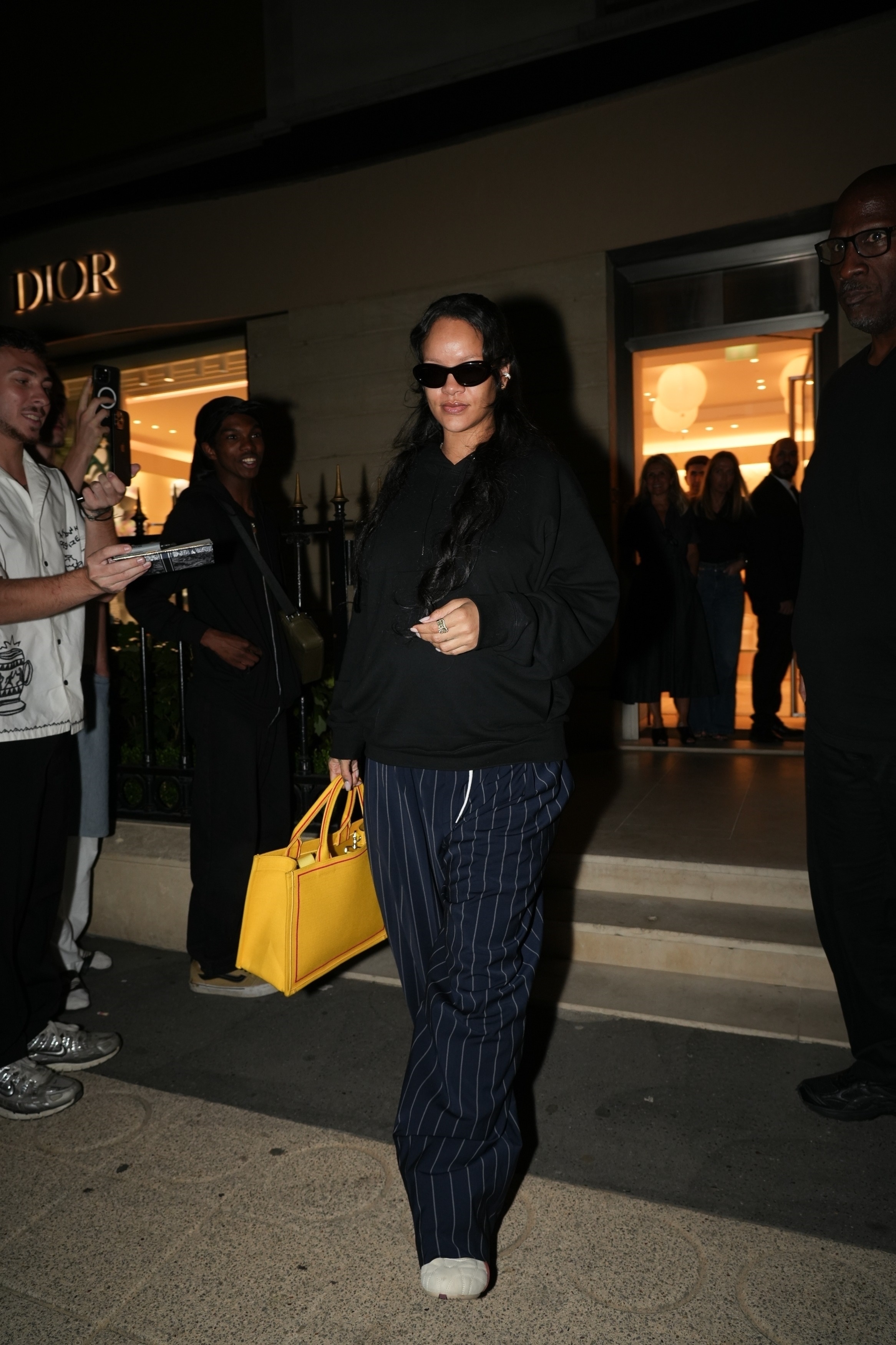 Rihanna wore her Dracula Dior Book Tote in July 2025