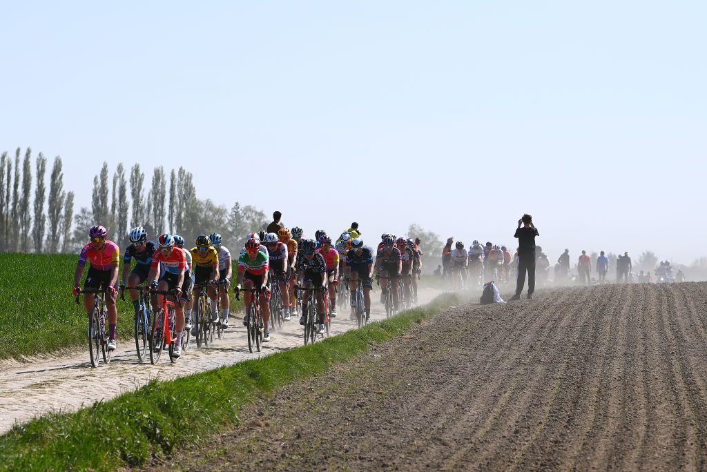 ROUBAIX FRANCE APRIL 16 A general view of the peloton competing through a cobblestones sector during the 2nd ParisRoubaix 2022 Womens Elite a 1247km one day race from Denain to Roubaix ParisRoubaixFemmes ParisRoubaix on April 16 2022 in Roubaix France Photo by Tim de WaeleGetty Images