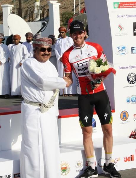 Matt Goss shakes hands with a local Omani leader.