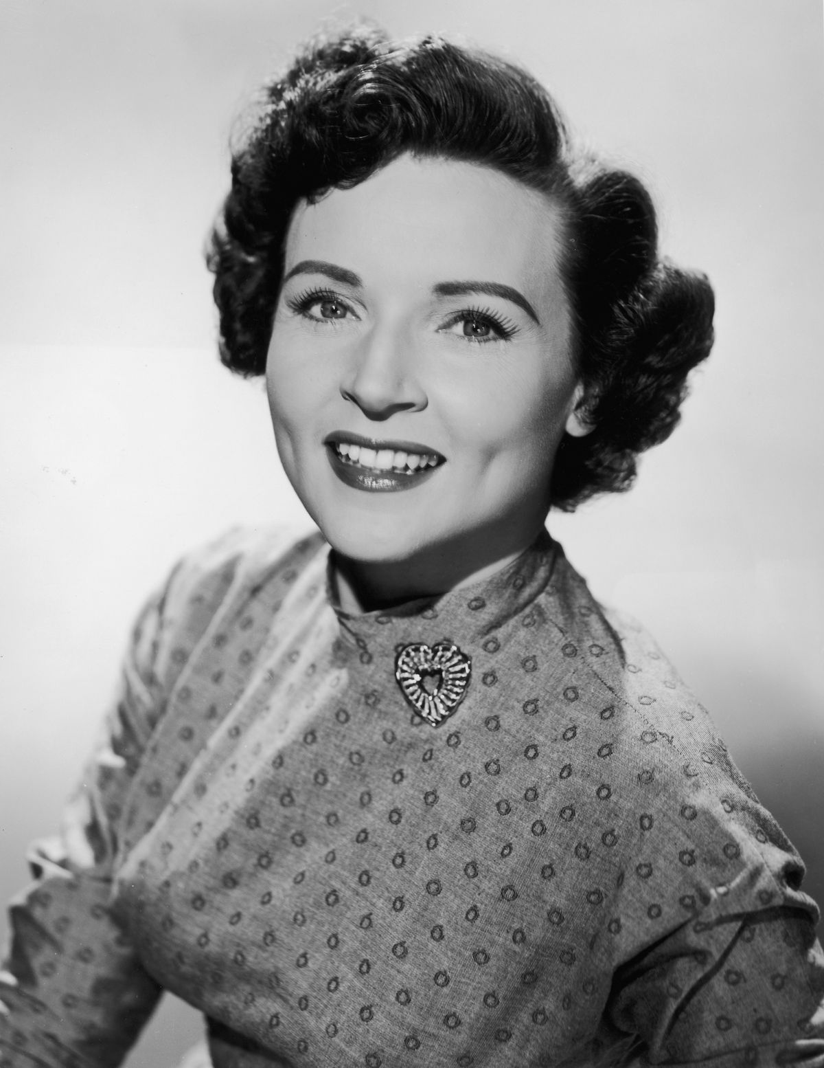A promotional studio portrait of Betty White in 1955