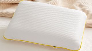 Eve Memory Pillow on bed