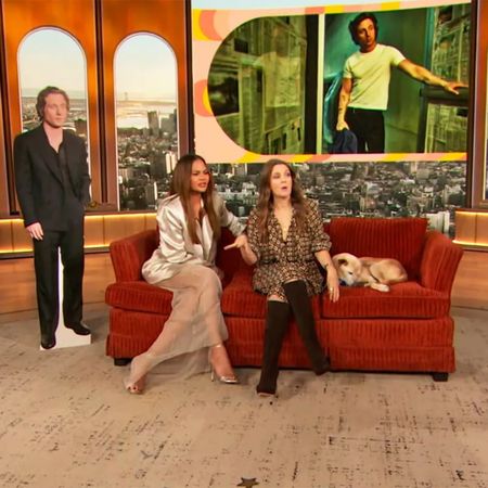 Drew Barrymore and Chrissy Teigen on the Jeremy Allen White Calvin Klein Couch