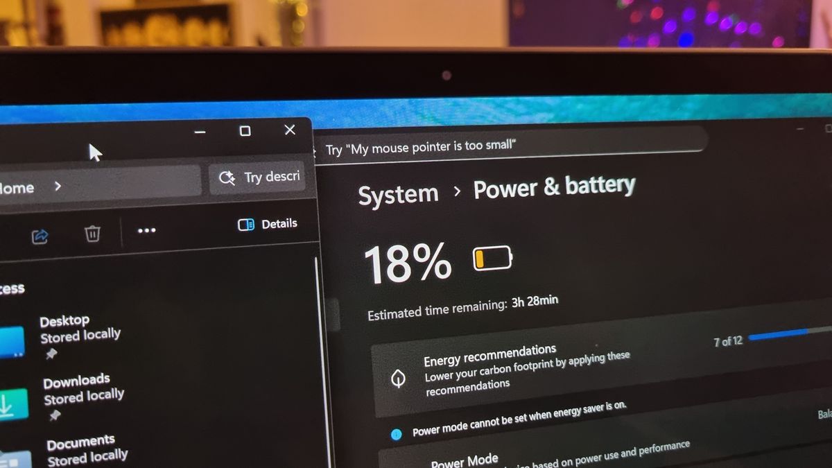 A photo of the display of the Asus Zenbook Duo laptop with 18% battery life remaining