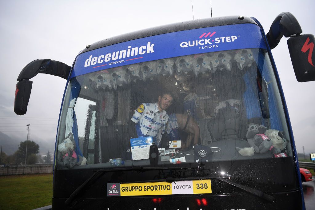 ASTI ITALY OCTOBER 23 Start Davide Ballerini of Italy and Team Deceuninck QuickStep Race neutralised due to heavy rain and team riders protest Bus Rain Detail view during the 103rd Giro dItalia 2020 Stage 19 a 258km stage from Morbegno to Asti girodiitalia Giro on October 23 2020 in Asti Italy Photo by Tim de WaeleGetty Images