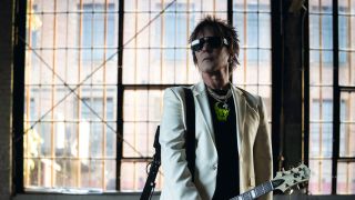 Billy Morrison portrait with guitar
