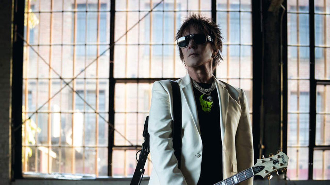 Billy Morrison portrait with guitar