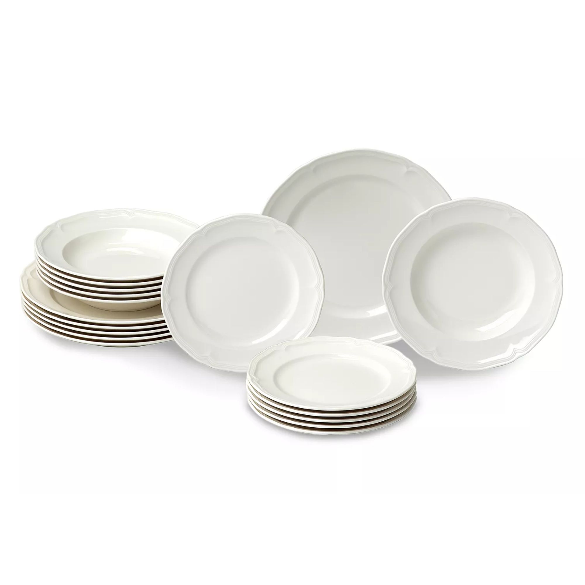 White dinnerware set with decorative detailing