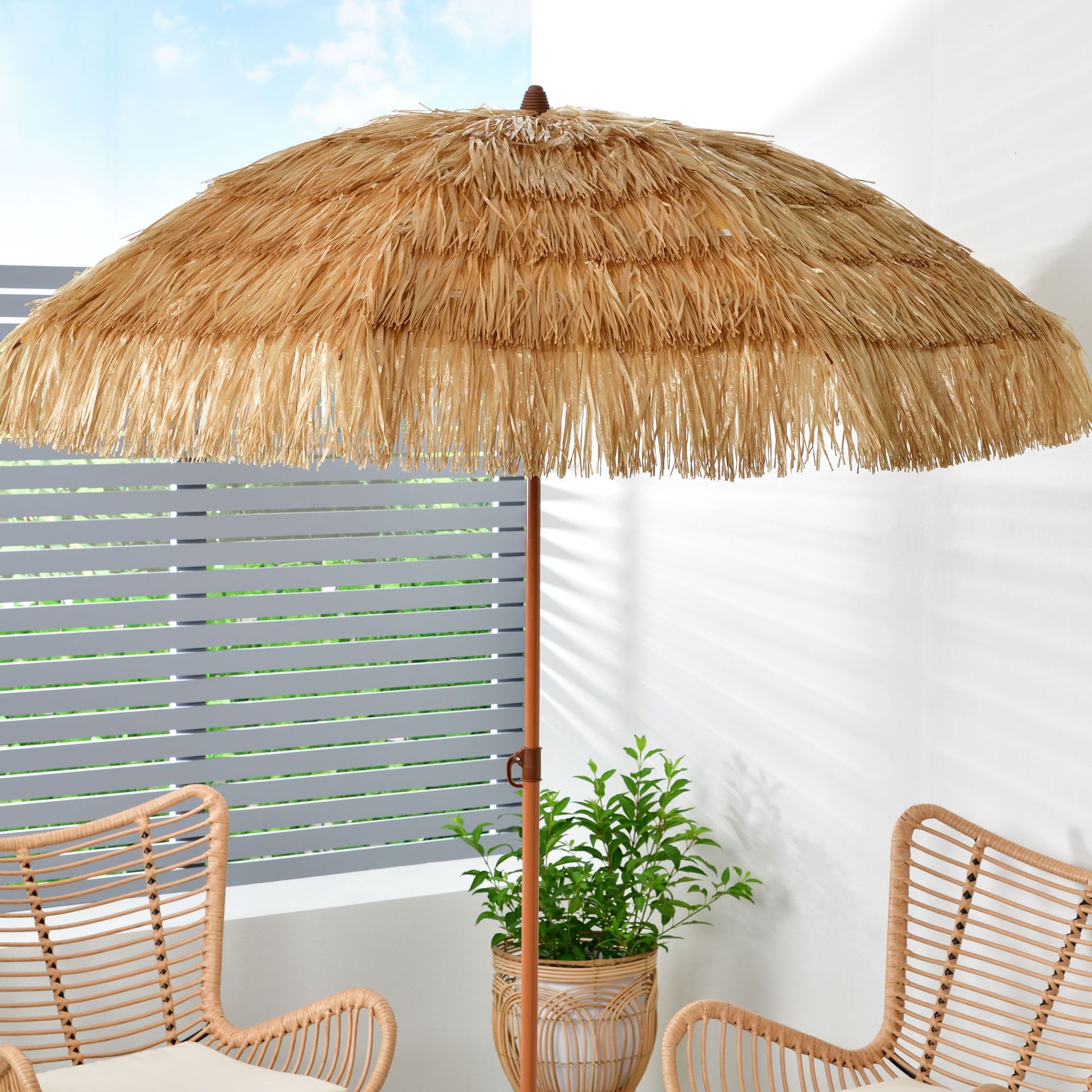 The B&M tiki bar and parasol are about to launch online and instore, and they're just the thing