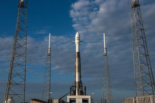 A SpaceX Falcon 9 rocket with a used first stage stands atop Space Launch Complex 40 at the Cape Canaveral Air Force Station in Florida on June 3, 2018 for launch of the SES-12 communications satellite. Liftoff is scheduled for June 4, 2018.