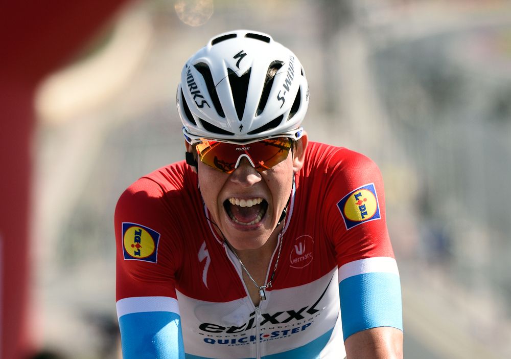 Bob Jungels of Etixx-Quick Step team celebrates after crossing the finish line during the first stage of the 7th cycling Tour of Oman