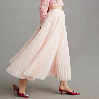 model wearing light pink Anthropologie Pleated Tulle Skirt