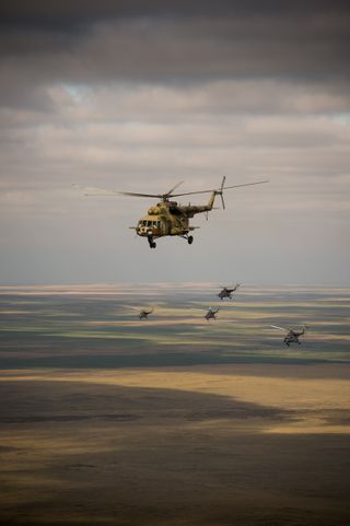 Helicopters Cruise in Soyuz Landing Prep