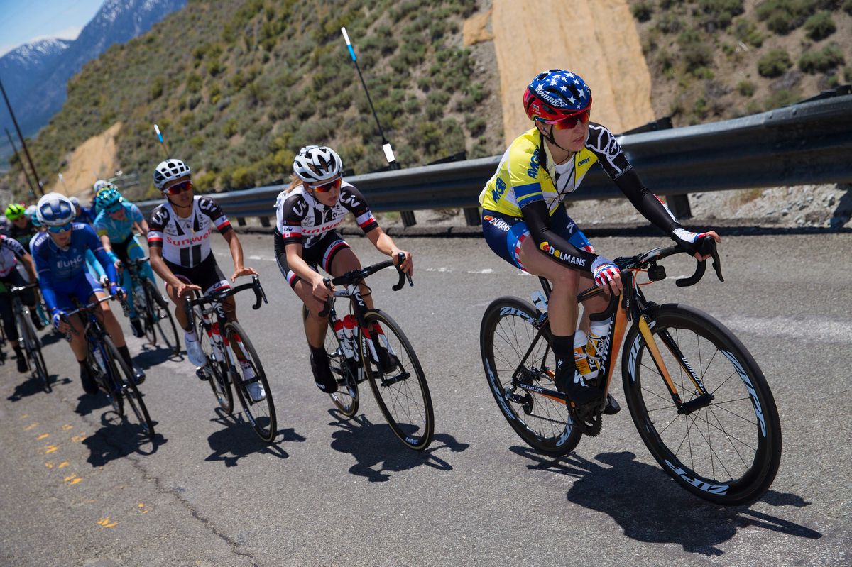 Race leader Megan Guarnier in the yellow jersey