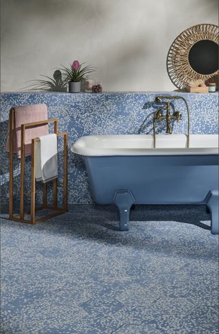 bathroom ideas with blue floor and backsplash and blue tub