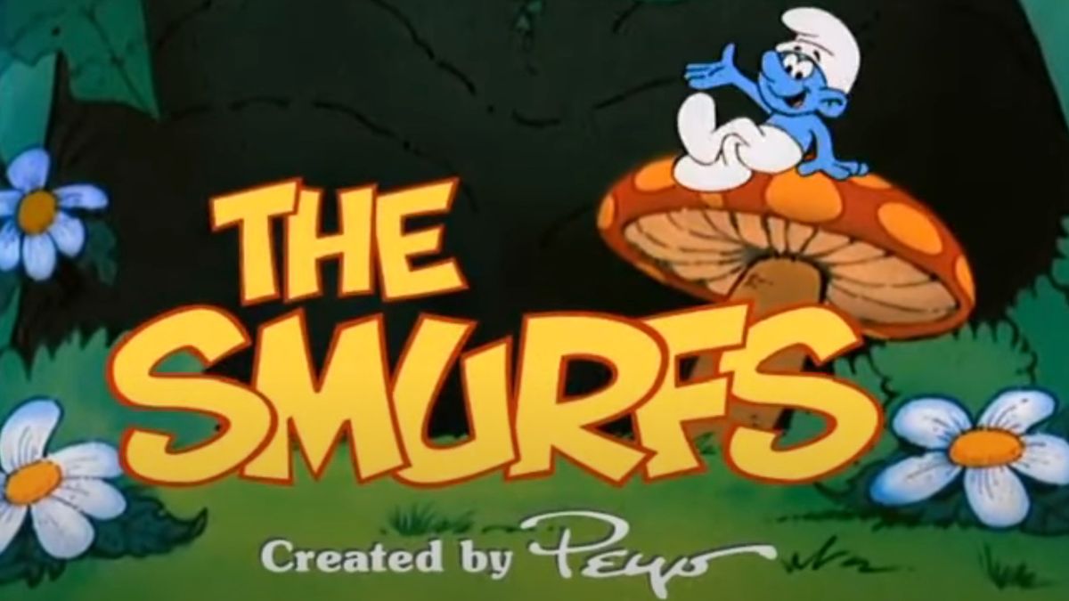 A smurf sits on a mushroom in The Smurfs title card.