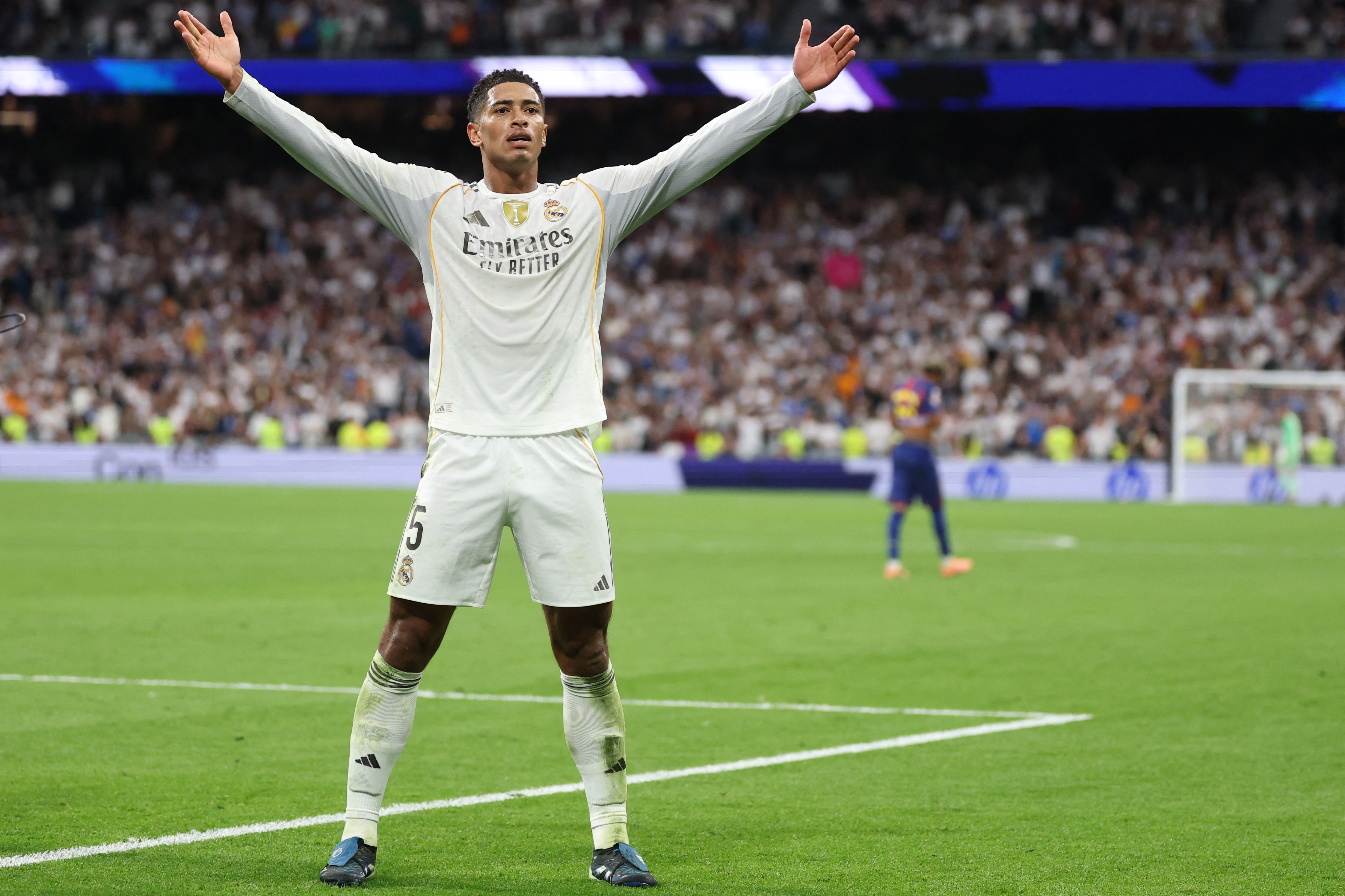 Real Madrid&#039;s English midfielder #05 Jude Bellingham celebrates scoring his team&#039;s second goal during the Spanish league football match between Real Madrid CF and FC Barcelona at Santiago Bernabeu Stadium in Madrid on October 26 , 2025.