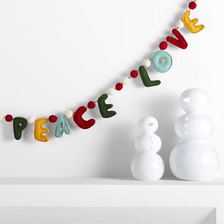 A colorful garland spelling out 'peace and love'