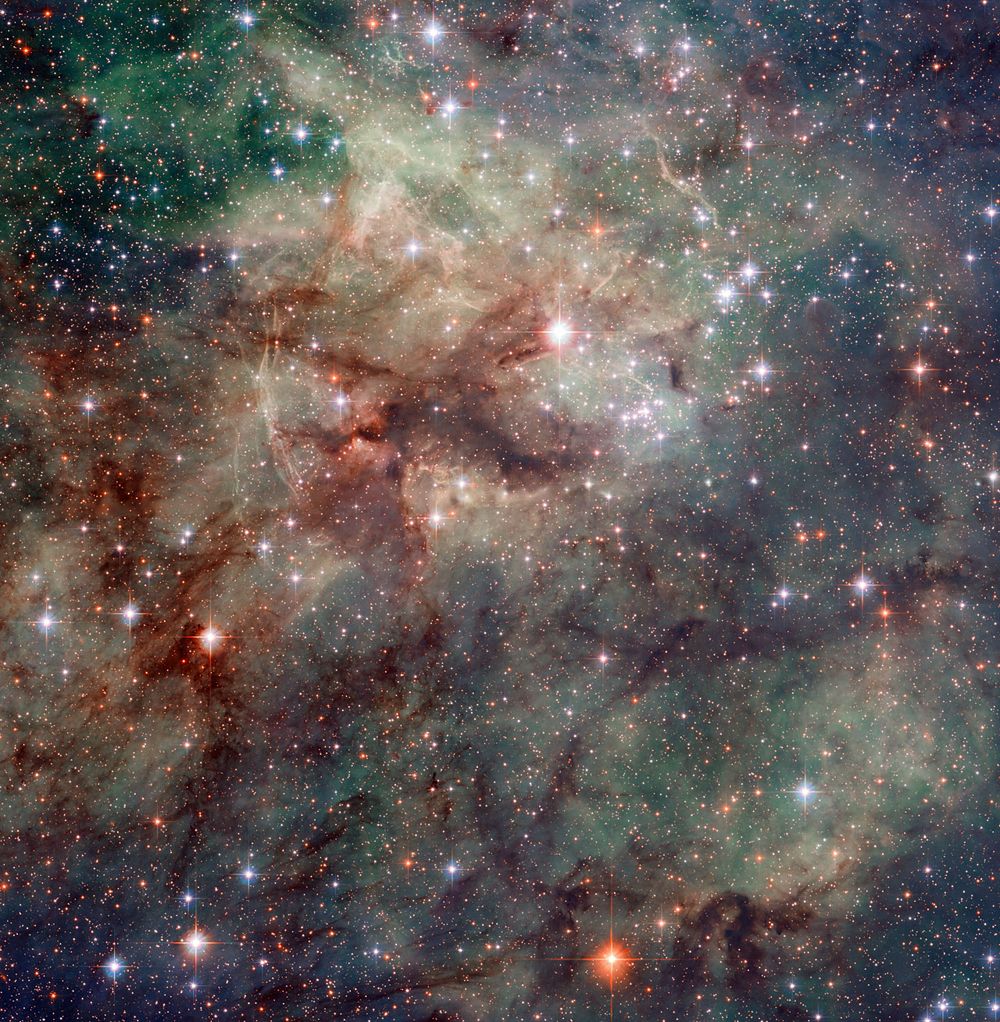 Hubble has taken this stunning close-up shot of part of the Tarantula Nebula. This star-forming region of ionised hydrogen gas is in the Large Magellanic Cloud, a small galaxy which neighbours the Milky Way.