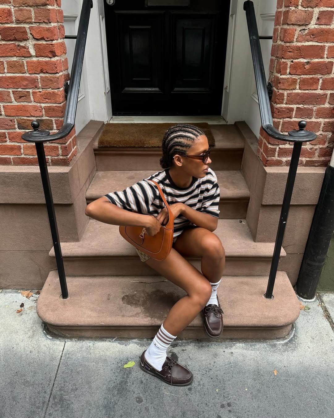 woman sitting on the stairs