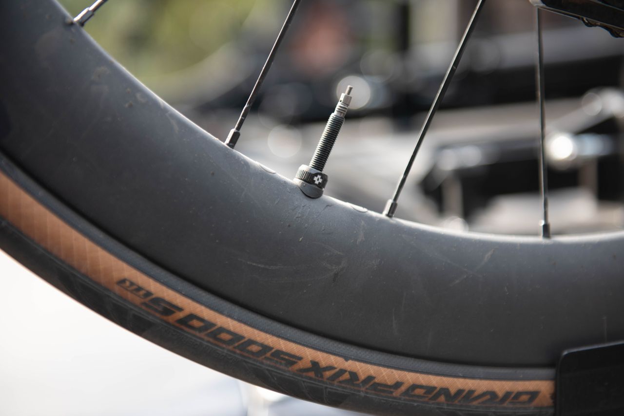 A close up of the tubeless valve on Michal Kwiatkowski's Pinarello Dogma F