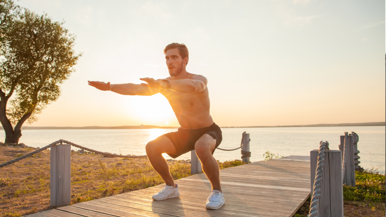 Man doing bodyweight squats