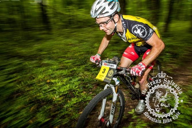 Justin Lindine flying through the woods.
