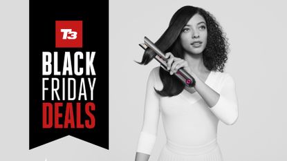 Woman using a Dyson Corrale with a T3 Black Friday deal banner on top