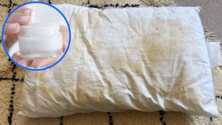 Yellow stains on pillow. In the top left foreground, there is a circular frame featuring a jar of face cream.