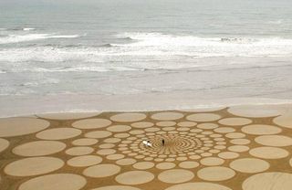 Jim Denevan works with natural materials to create beautiful, large scale patterns in the sand