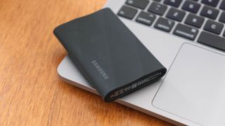 Samsung T9 portable SSD on a MacBook Pro laptop