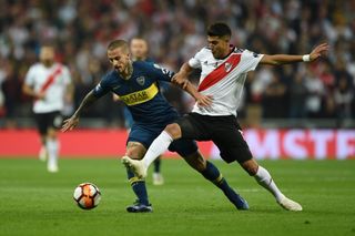 Boca Juniors and River Plate in action in the second leg of the Copa Libertadores final at the Santiago Bernabeu in December 2018.