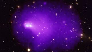 Abell 2146, which is a huge collision between a pair of galaxy clusters, located 2.8 billion light-years from the Milky Way. Here, the hot intra-cluster gas, imaged by Chandra, is shown in false color (blue).