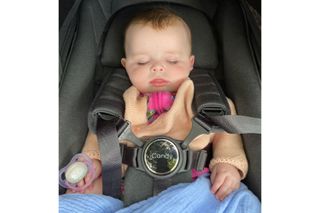 The iCandy Peach 7 pram pictured with our tester's baby daughter asleep in the seat