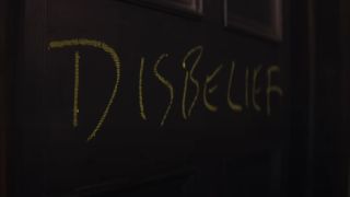 Disbelief written on a door in Heretic.