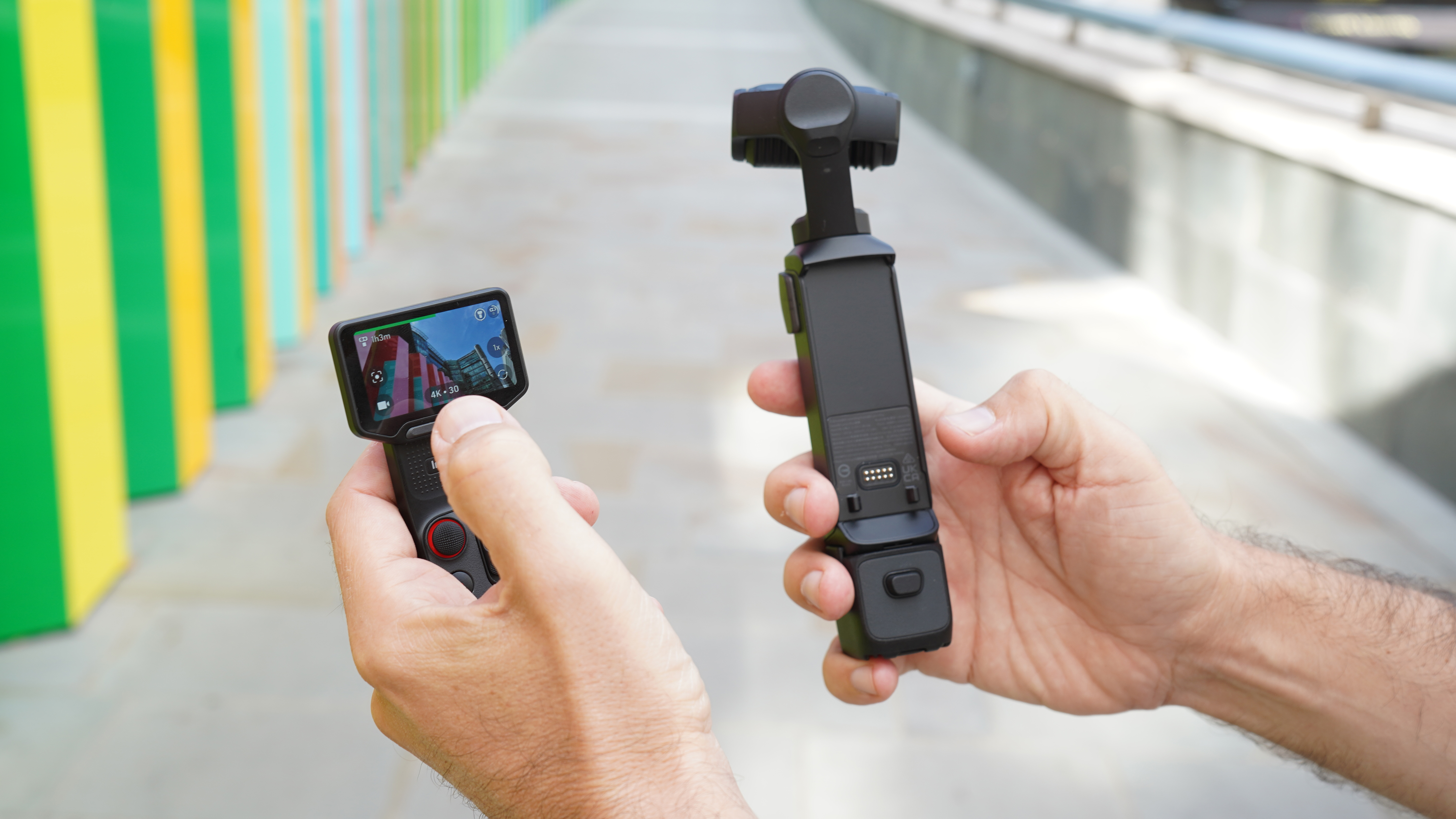 Insta360 Luna Ultra held with remote separately