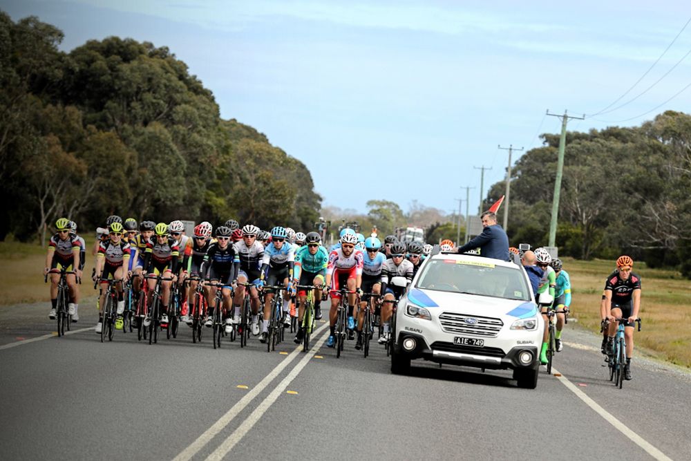 The peloton rolls out of George Town in neutral before stage 1 of the Spirit of Tasmania Tour of Tasmania begins.