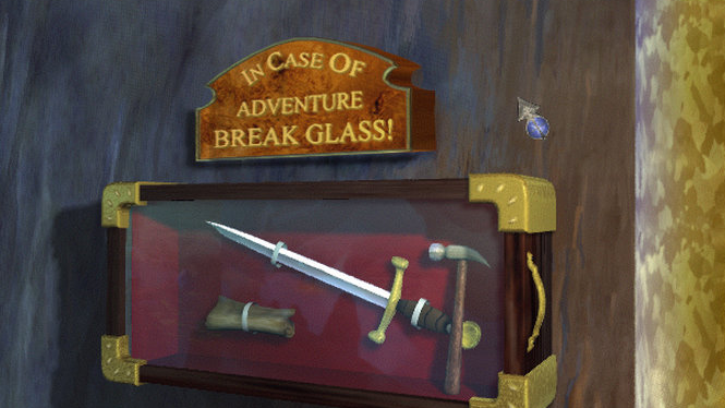 A sign saying "In case of adventure break glass!" above a sword in a display case.