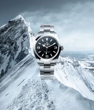 rolex watch against mountain backdrop: Rolex Oyster Perpetual Explorer 40