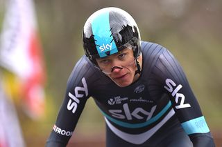 Chris Froome rode against the cold, wet conditions during the Romandie prologue.