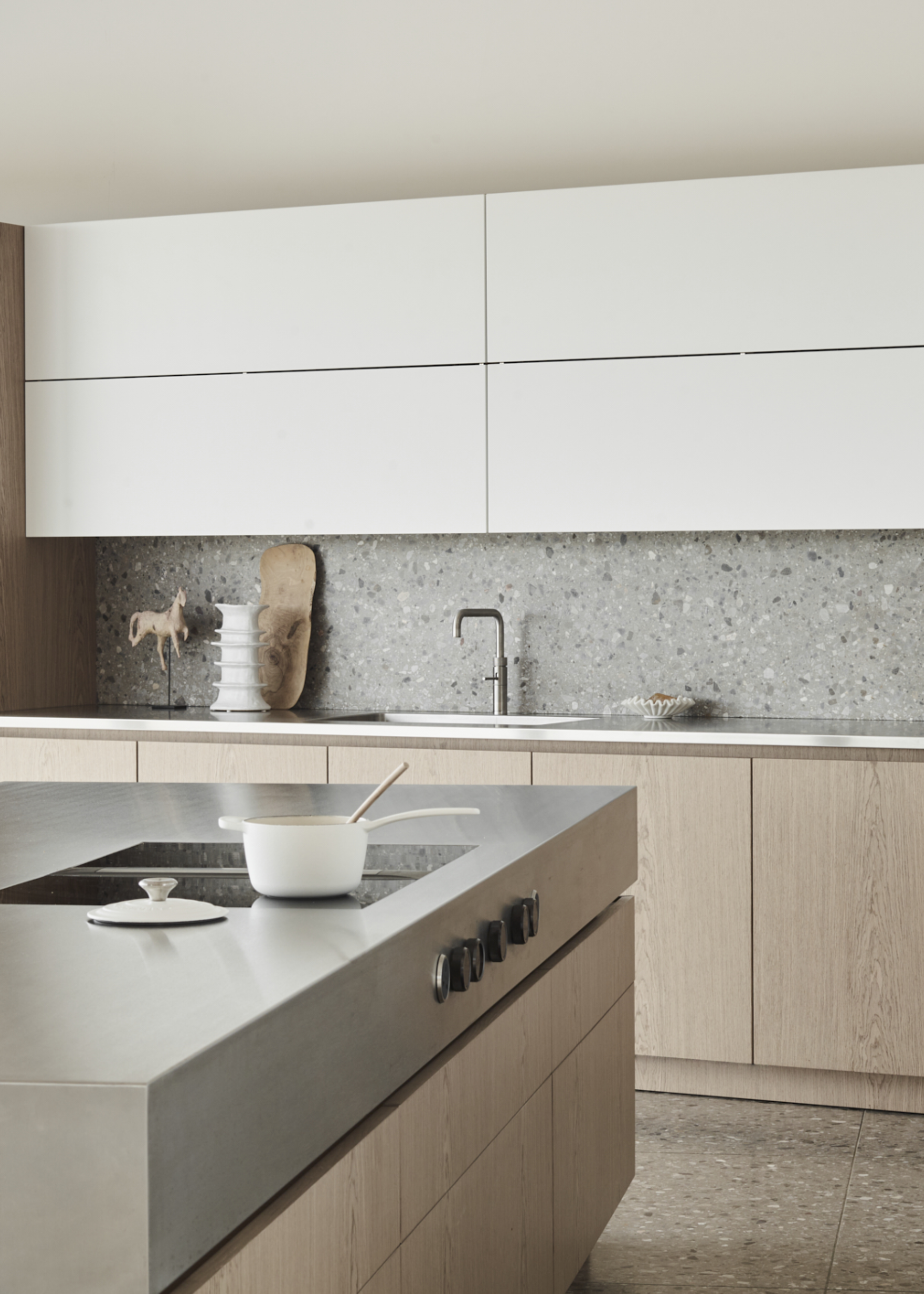 A kitchen with large sockets on the island