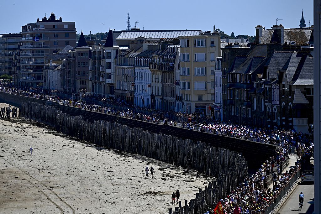 The pack of riders pictured at the start of stage seven of the 2025 Tour de France cycling, from Saint-Malo to Mur-de-Bretagne (194 km), on Friday 11 July 2025 in France. The 112th edition of the Tour de France starts on Saturday 5 July in Lille, France, and will finish in Paris, France on the 27th of July. BELGA PHOTO JASPER JACOBS (Photo by JASPER JACOBS / BELGA MAG / Belga via AFP)