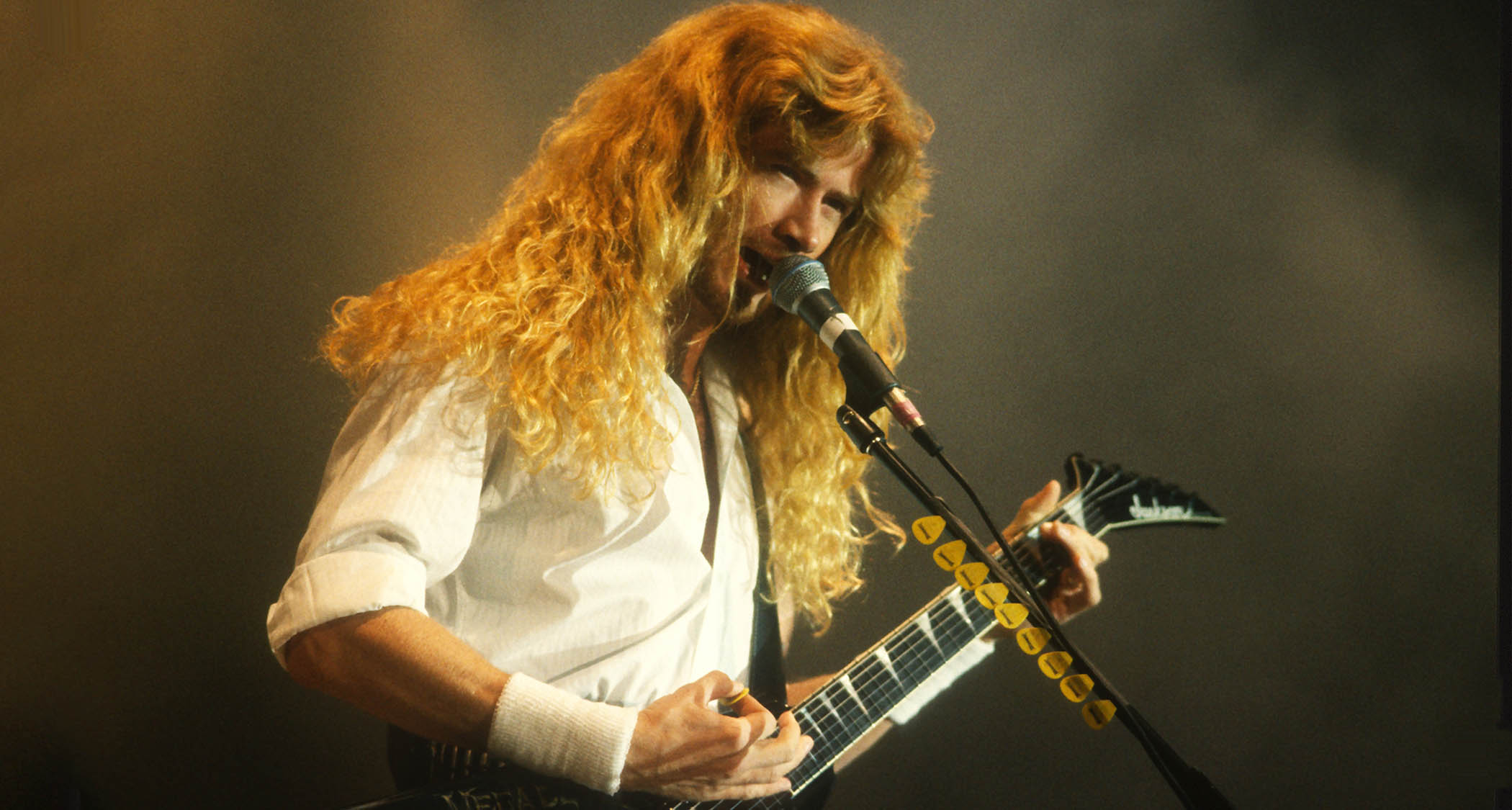 Dave Mustaine of Megadeth pictured playing a Jackson King V live in the '90s.