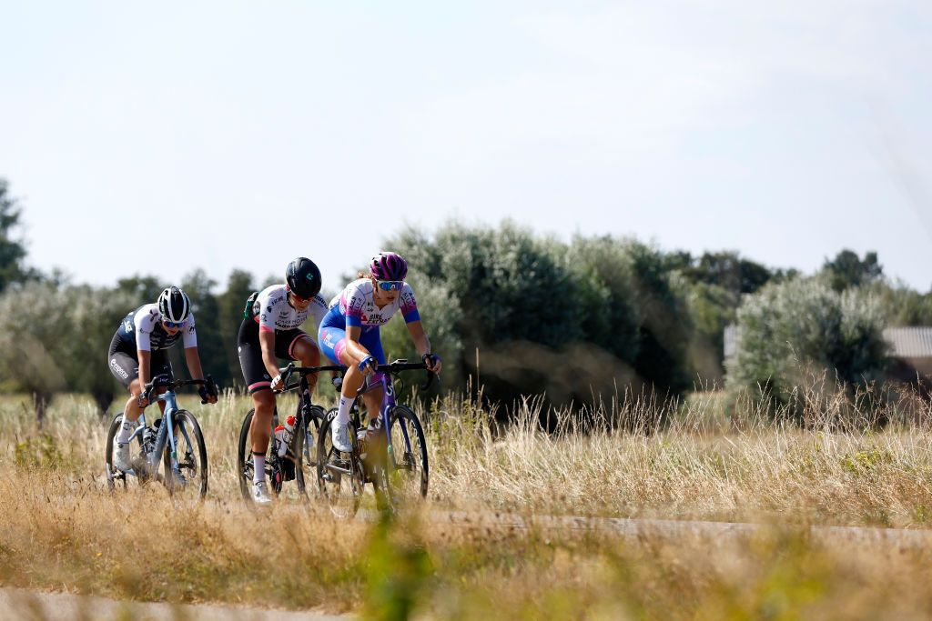 EDE NETHERLANDS AUGUST 31 LR Senne Knaven of Belgium and AG Insurance NXTG Team Lieke Nooijen of Netherlands and Team Parkhotel Valkenburg and Georgia Baker of Australia and Team BikeExchange Jayco compete in the breakaway during 25th Simac Ladies Tour 2022 Stage 2 a 1178km stage from Ede to Ede SLT2022 UCIWWT on August 31 2022 in Ede Netherlands Photo by Bas CzerwinskiGetty Images