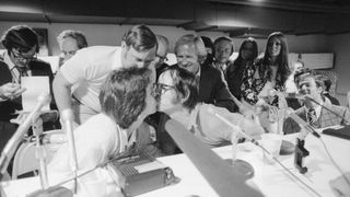 Billie Jean King and Bobby Riggs kiss in post-match conference