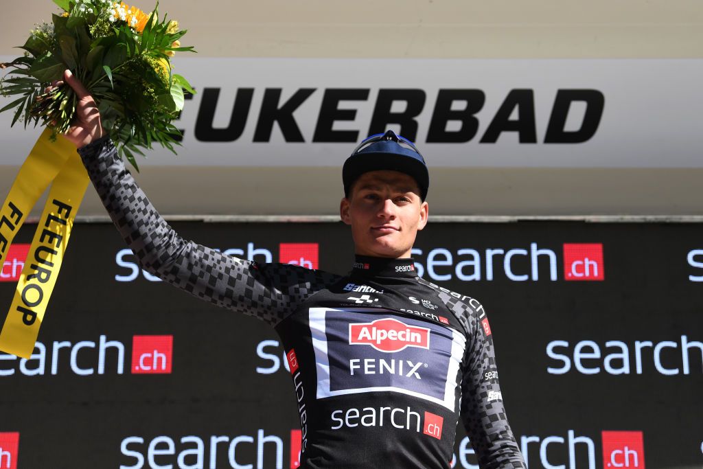 LEUKERBAD SWITZERLAND JUNE 10 Mathieu Van Der Poel of Netherlands and Team AlpecinFenix Black Points Jersey celebrates at podium during the 84th Tour de Suisse 2021 Stage 5 a 1752km stage from Gstaad to Leukerbad 1385m UCIworldtour tds tourdesuisse on June 10 2021 in Leukerbad Switzerland Photo by Tim de WaeleGetty Images