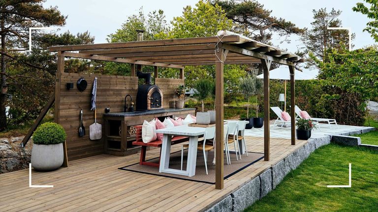 outdoor kitchen ideas on raised decking with pergola structure surround